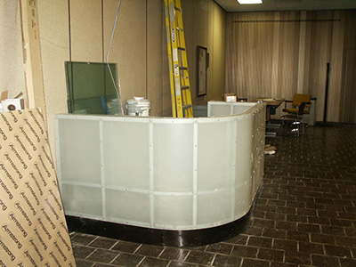 Decorative curved counter with translucnet flat fiberglass